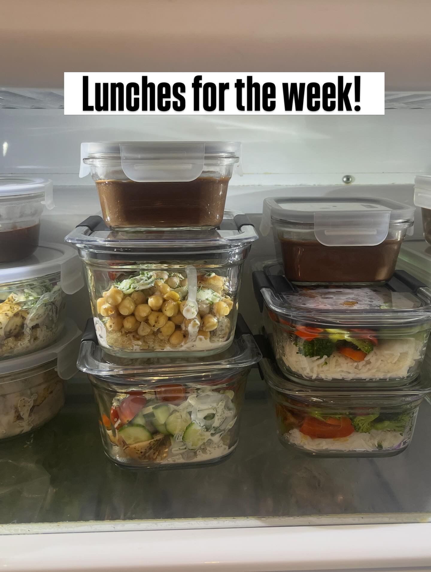 Meal prep containers of lunches stacked in a refrigerator with the text “Lunches for the week!”