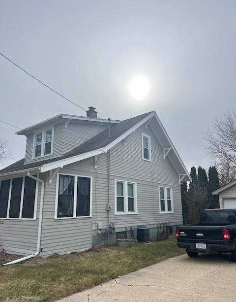 A freshly painted house  on a cloudy day.