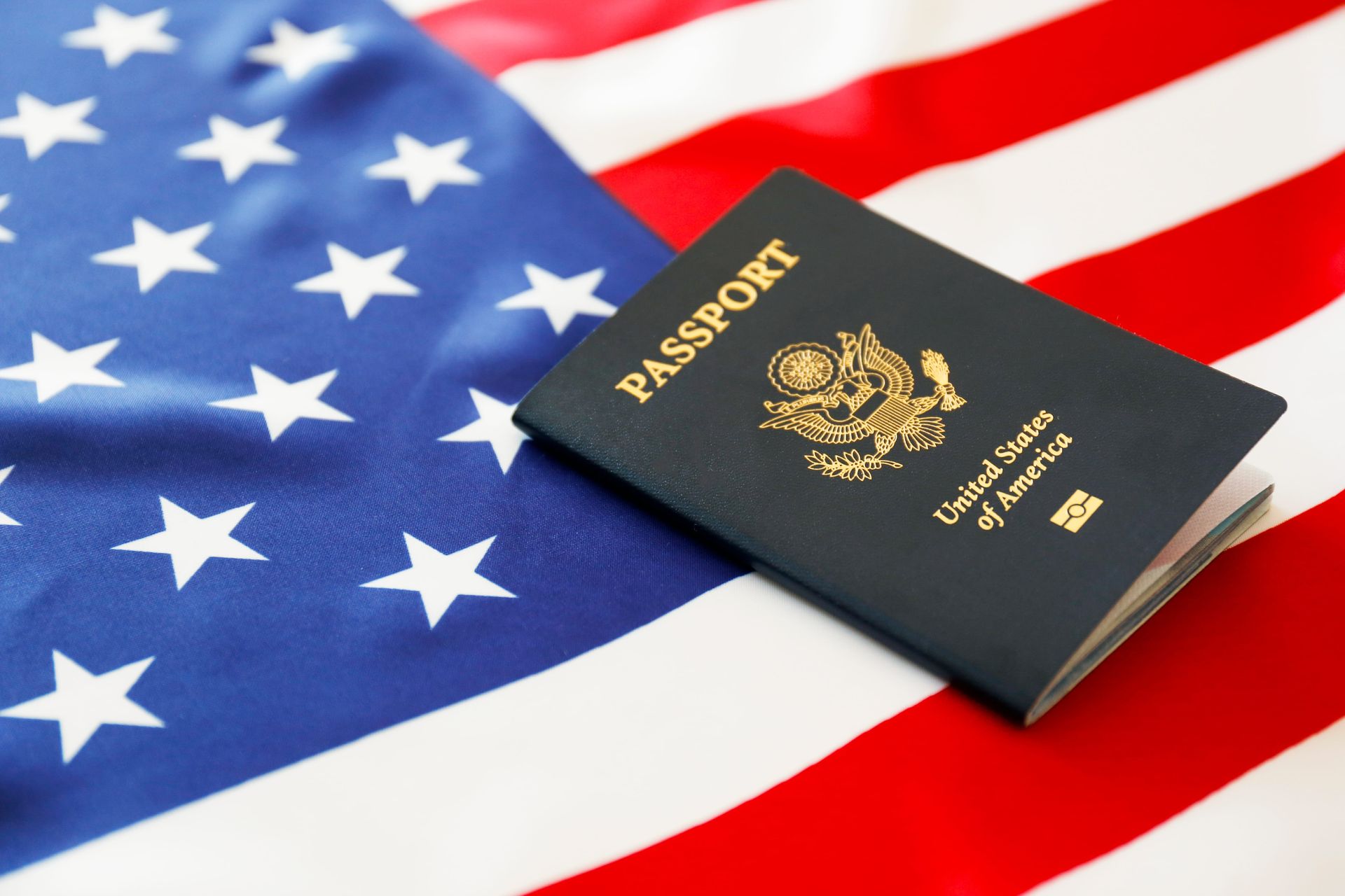 U.S. passport on an American flag background