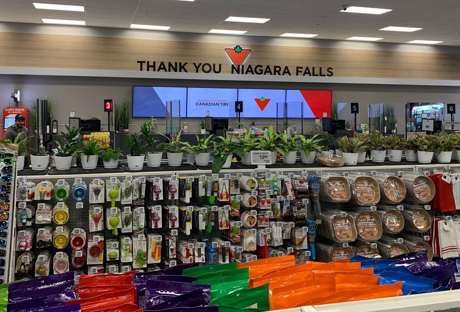 Souvenir display inside Niagara Falls  Canadian Tire shop with colourful merchandise and “THANK YOU NIAGARA FALLS” sign