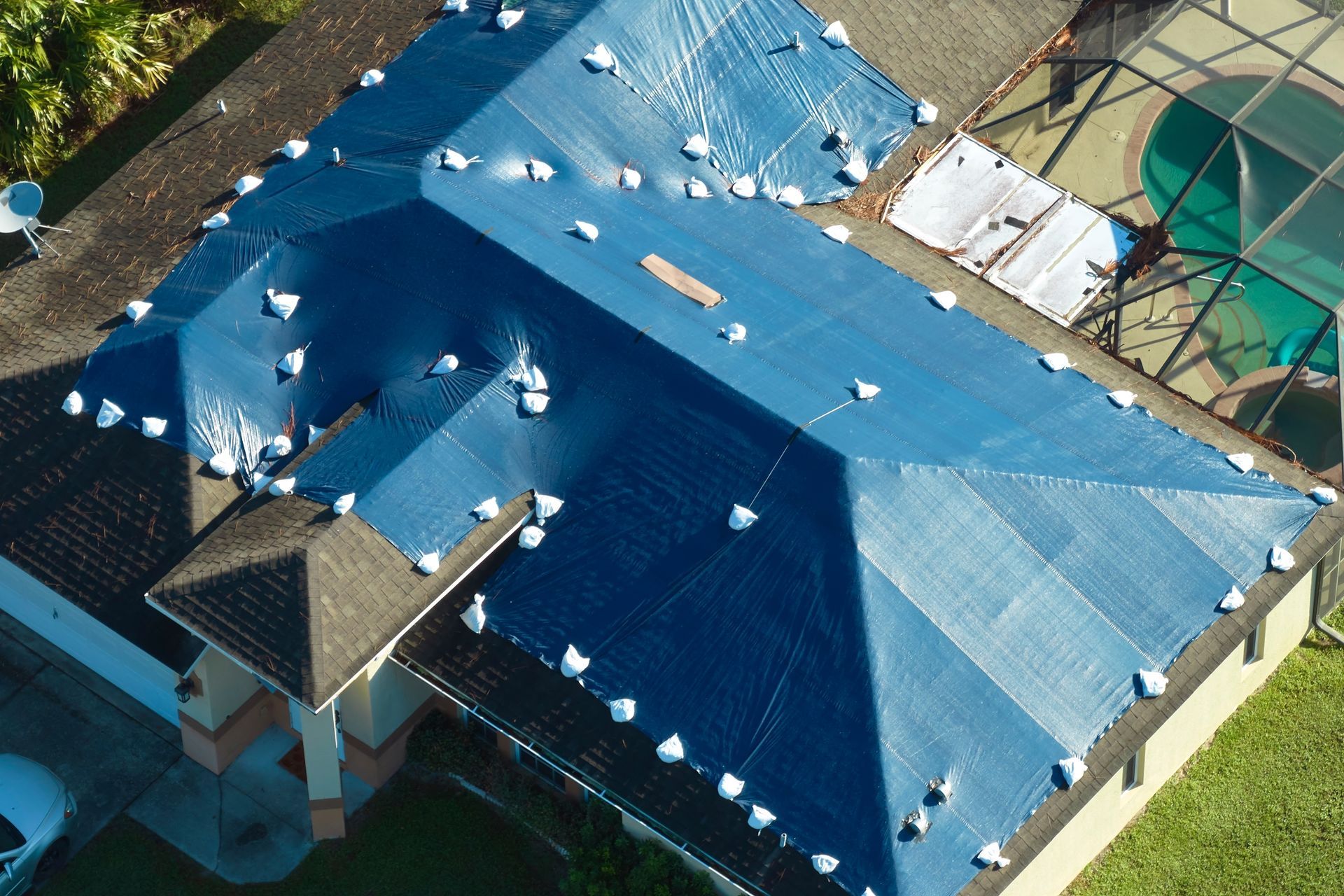 Roofer Preparing Part Of Roof — Jacksonville, FL — FORTRESS ROOFING AND CONSTRUCTION LLC Roofer Roof — Jacksonville, FL — FORTRESS ROOFING AND CONSTRUCTION LLC