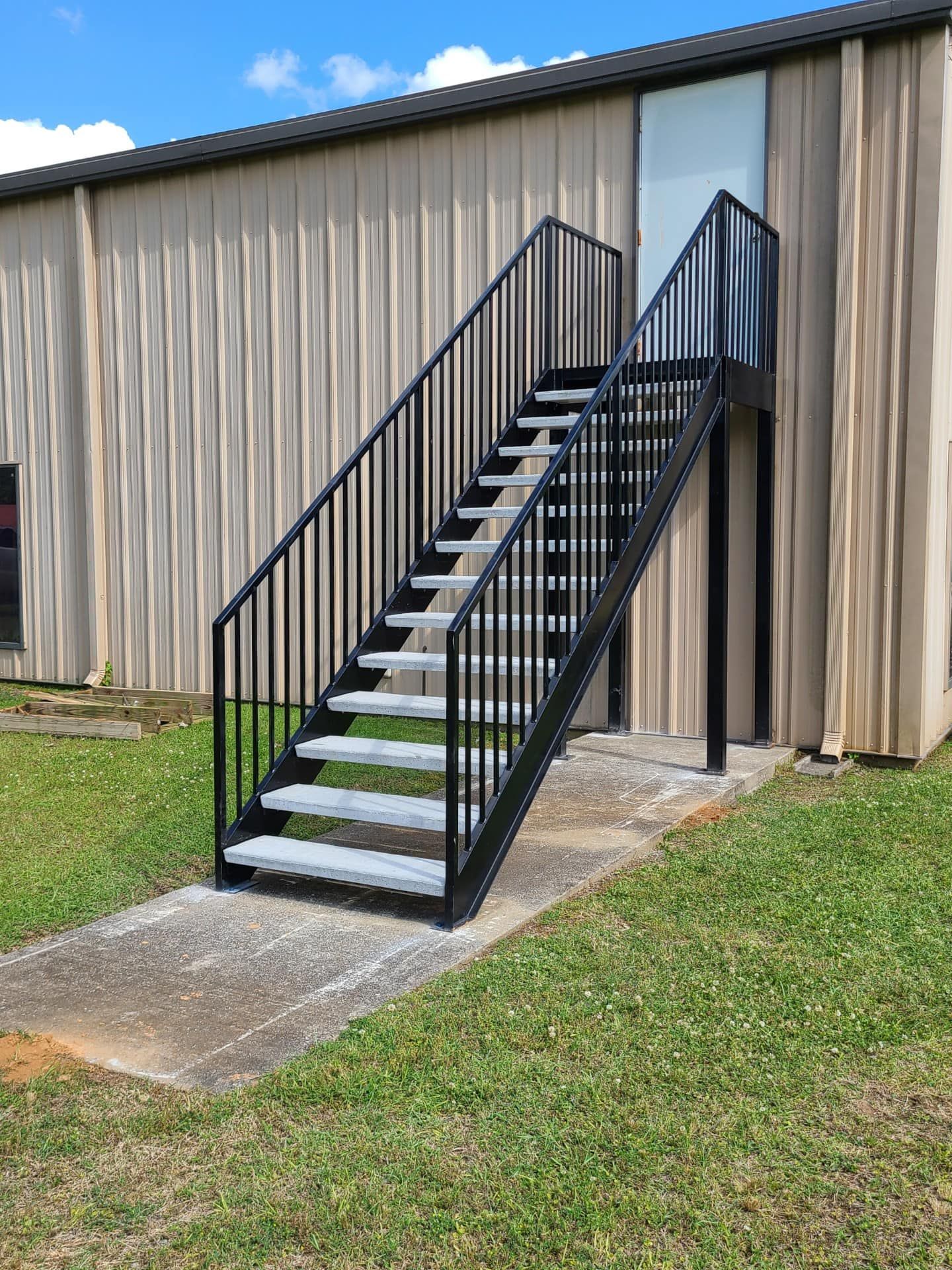 A set of stairs leading up to a building.