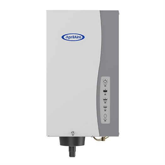 Aprilaire whole-house humidifier, white and gray, mounted on a wall. Has a black outlet nozzle.