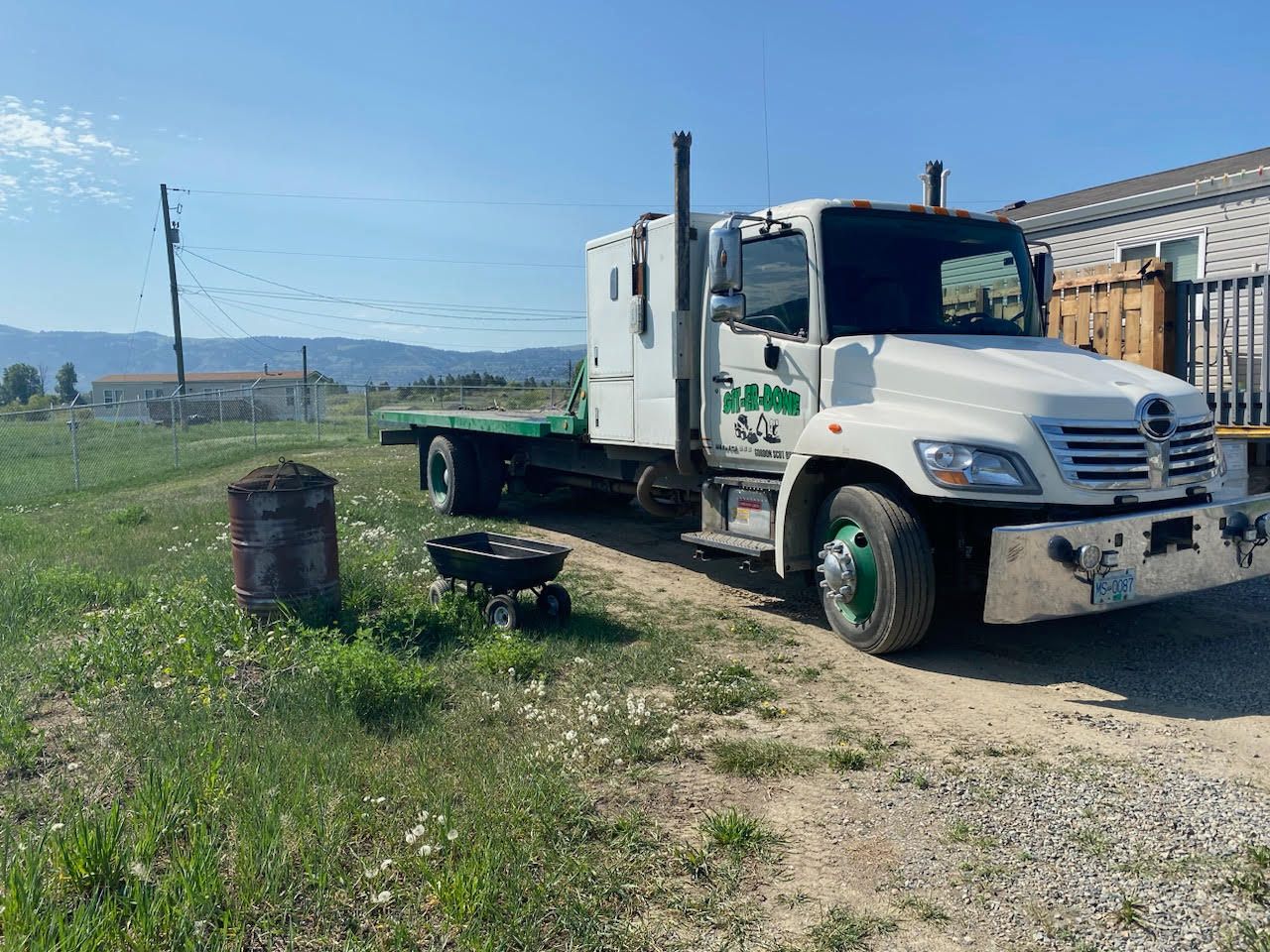 Git-Er-Done Towing truck parked on roadside