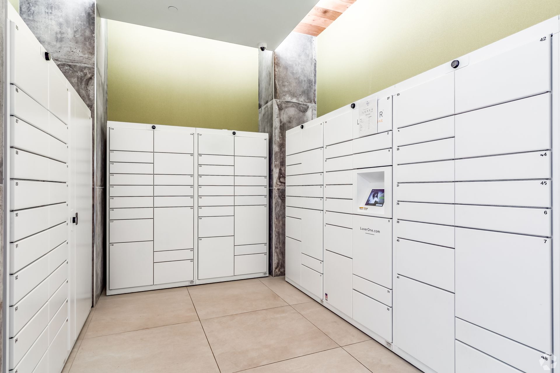 A room filled with lots of white lockers