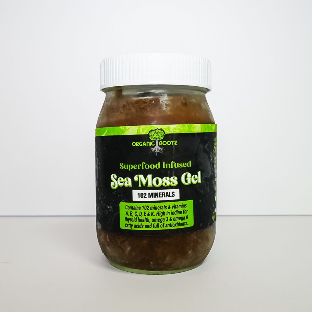 Jar of Superfood Infused Sea Moss Gel with black label and white lid on a plain background