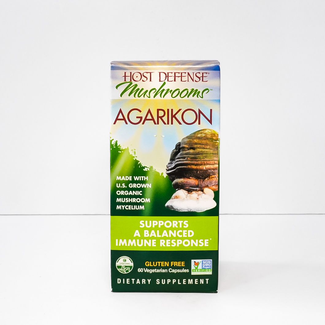 Health Defense Mushrooms Agarikon dietary supplement bottle with mushroom illustration and green label