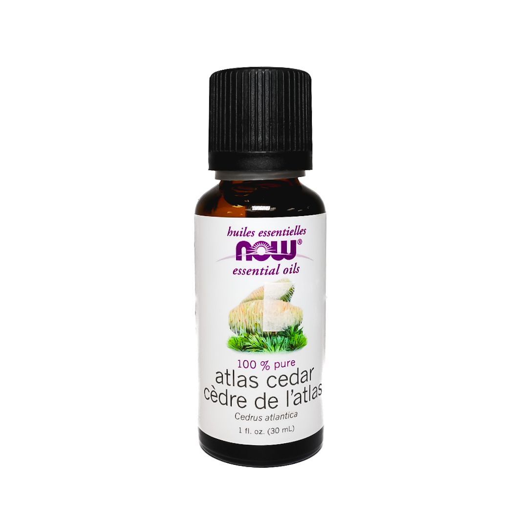 Black supplement bottle with white label showing product information, isolated on a white background