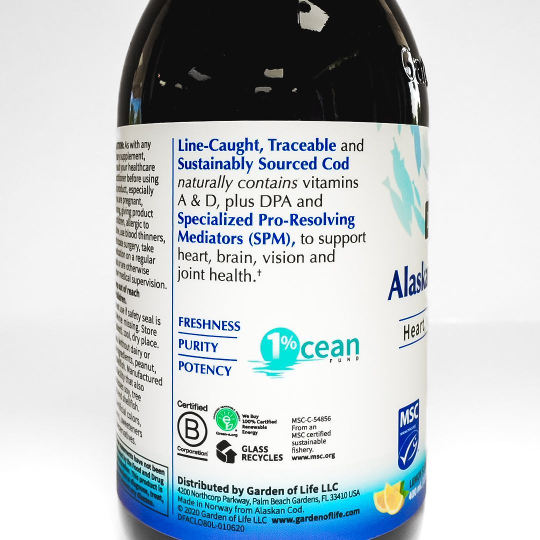 Bottle of Alaskan Cod Liver Oil with blue-and-white label and silver cap