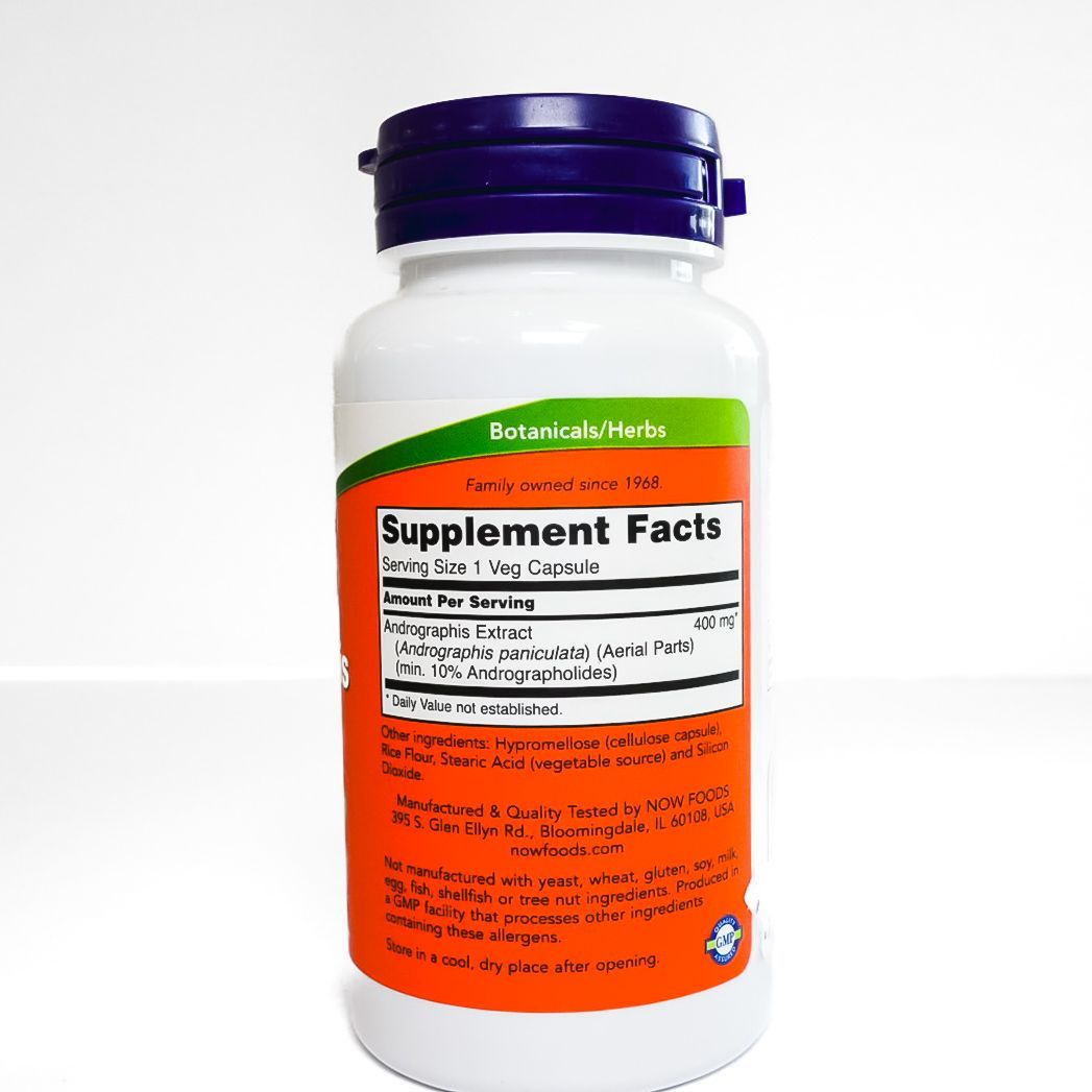 Bottle of NOW Andrographis Extract 400 mg with orange label and purple cap on white background
