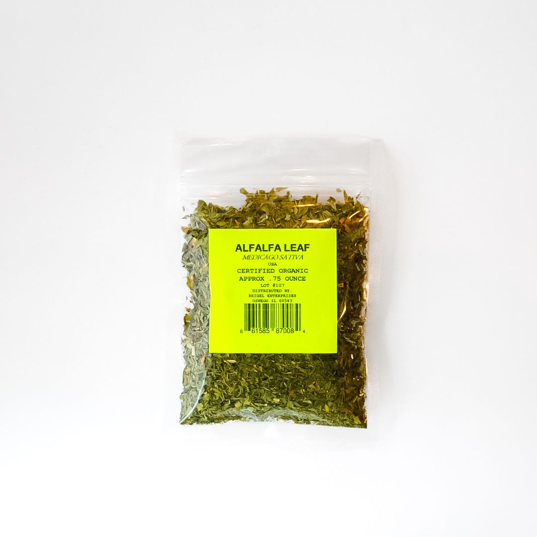 Clear plastic bag of dried herbs with a bright yellow label on a white background