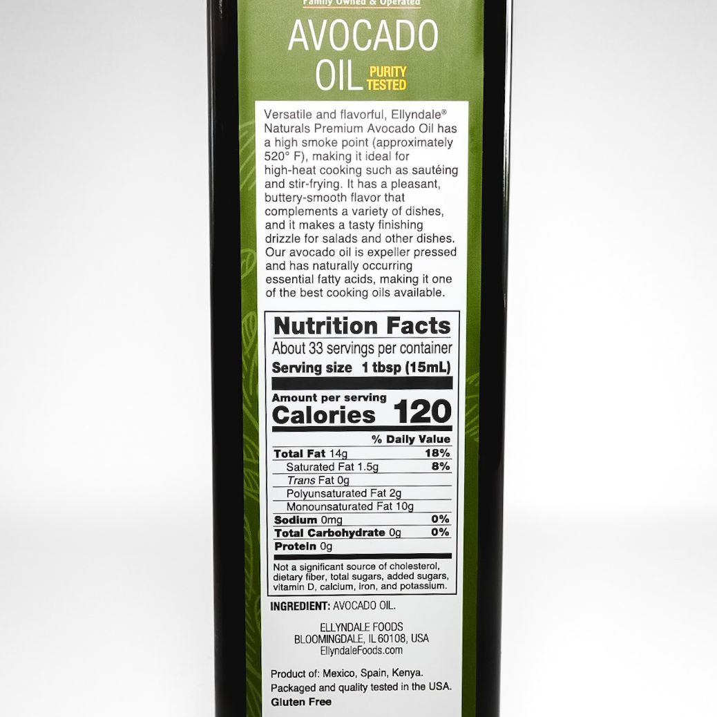 Bottle of Lucini avocado oil with green label on a white background
