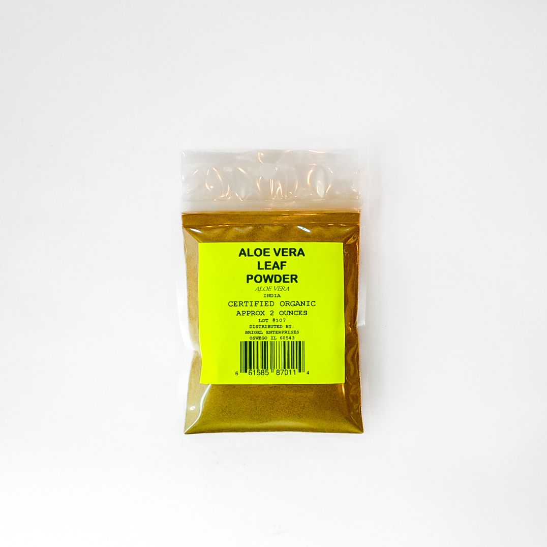 Small plastic pouch of yellow aloe vera leaf powder with a bright green label on a white background