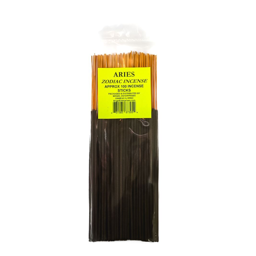 Clear plastic bag of black incense sticks with a yellow label, isolated on a white background