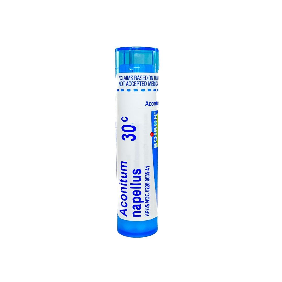 Blue magnesium tablets tube with white label and blue cap on a white background
