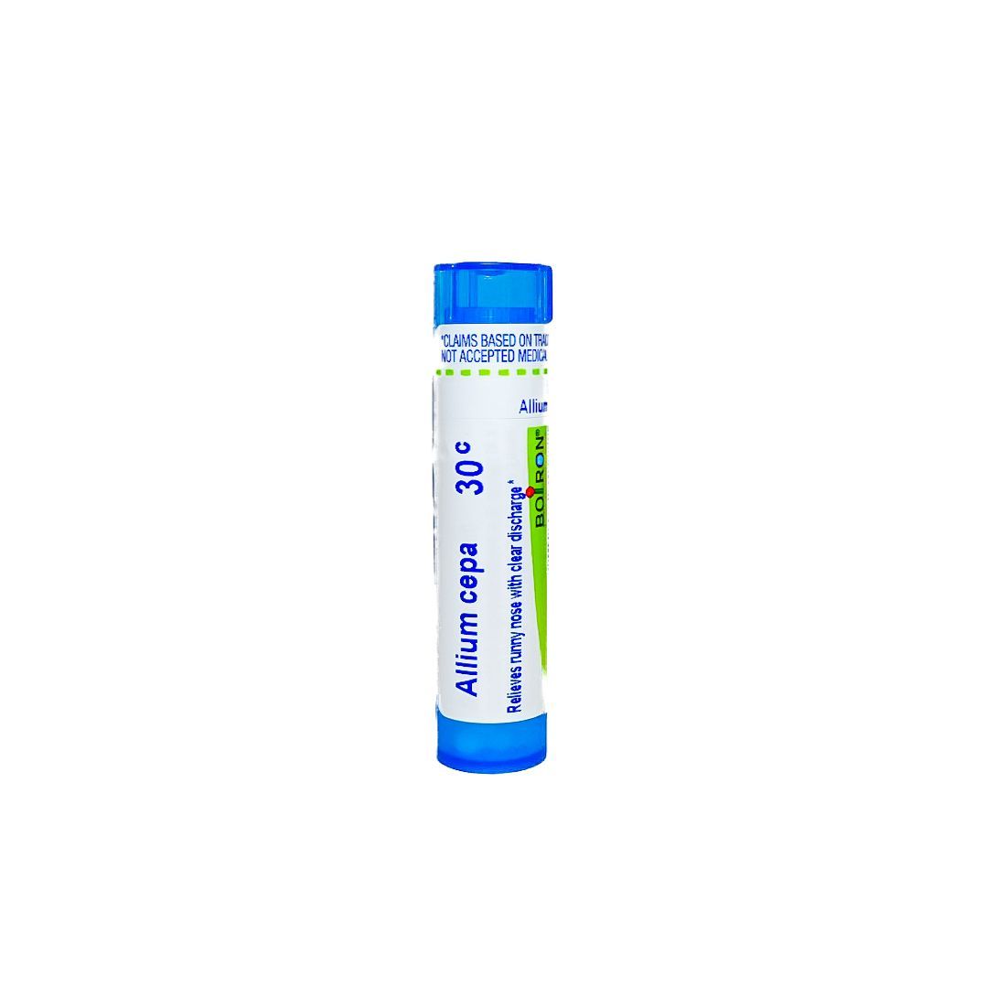 Blue cylindrical medicine tube labeled “Acidum” with a blue cap.