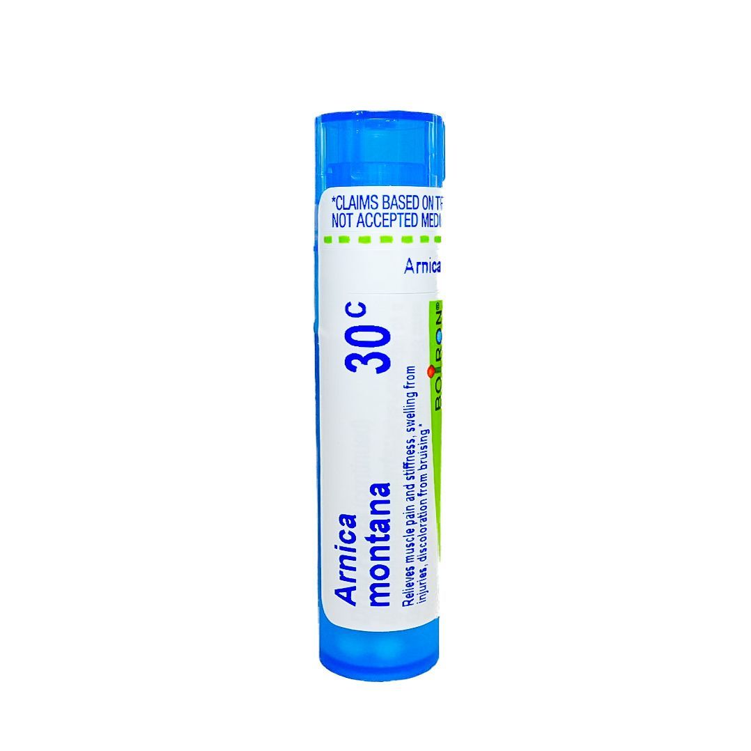 Blue-capped tube labeled Arnica montana 30C on a white background