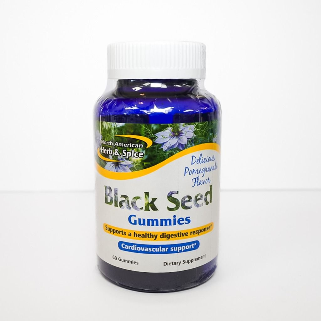 Bottle of Black Seed Gummies supplement with blue label and white cap on a white background