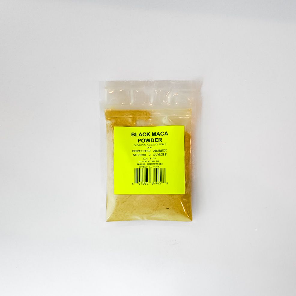 Clear plastic bag of black maca powder with a bright yellow label on a white background