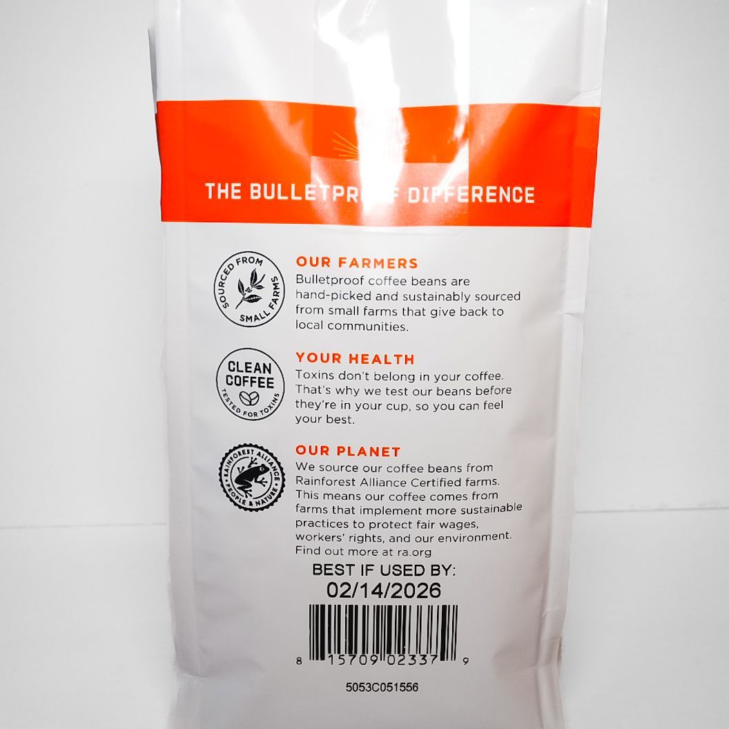Bulletproof Breakfast Blend coffee bag with orange and white packaging on a plain background