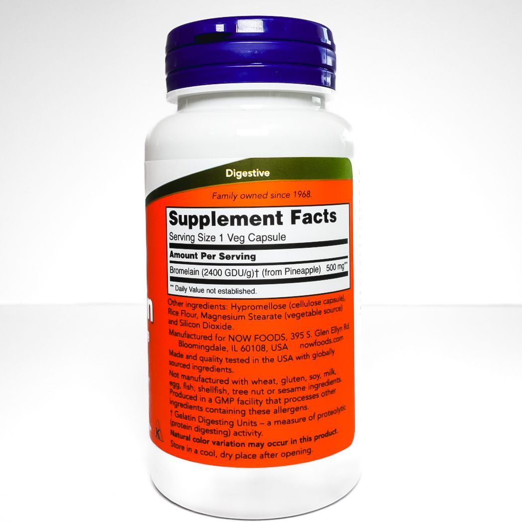 NOW Bromelain dietary supplement bottle with purple cap and orange label on a white background