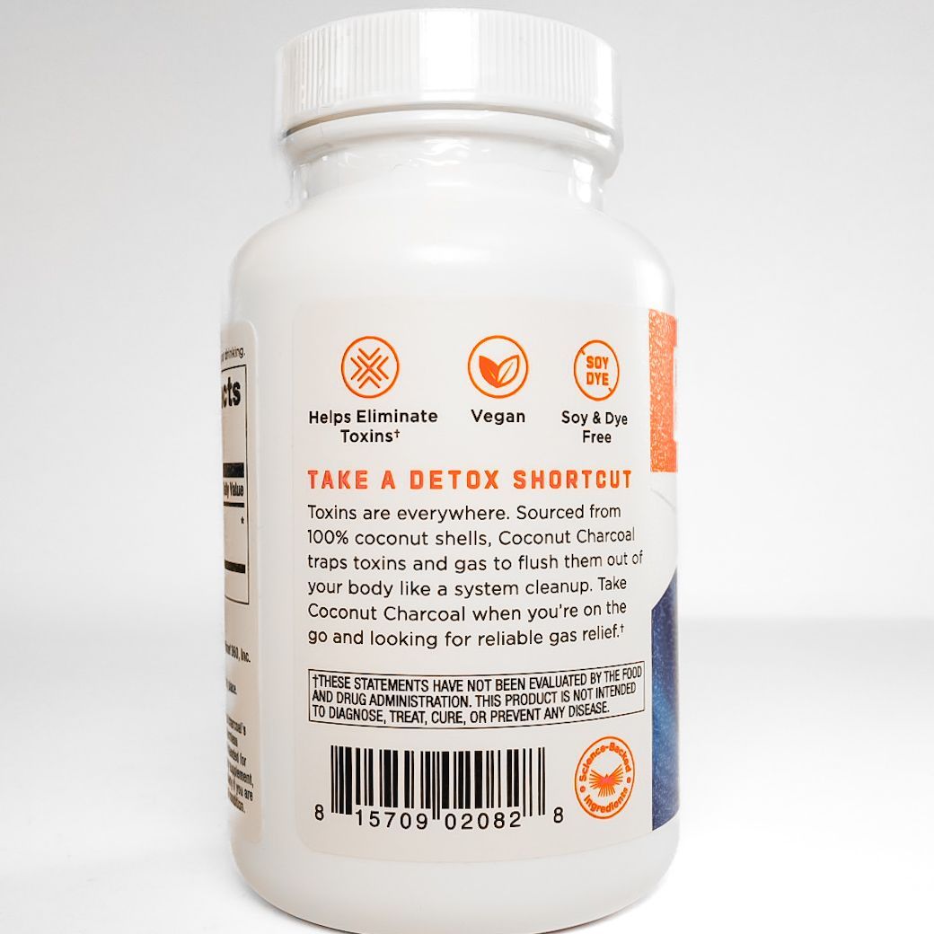Bulletproof Coconut Charcoal coffee and gum powder bottle with orange and blue label