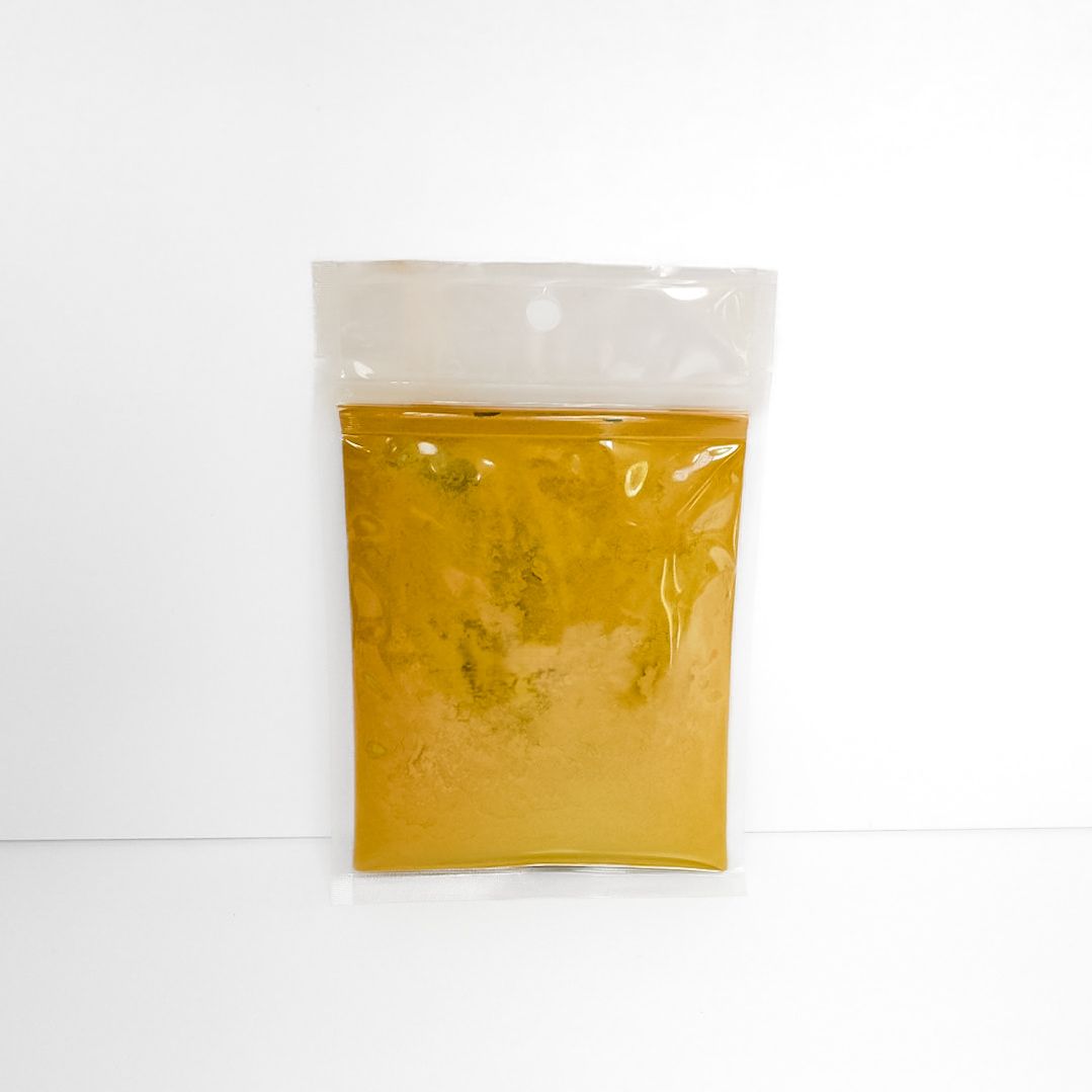 Bag of Bladderwrack powder with yellow label and clear top, on a white background