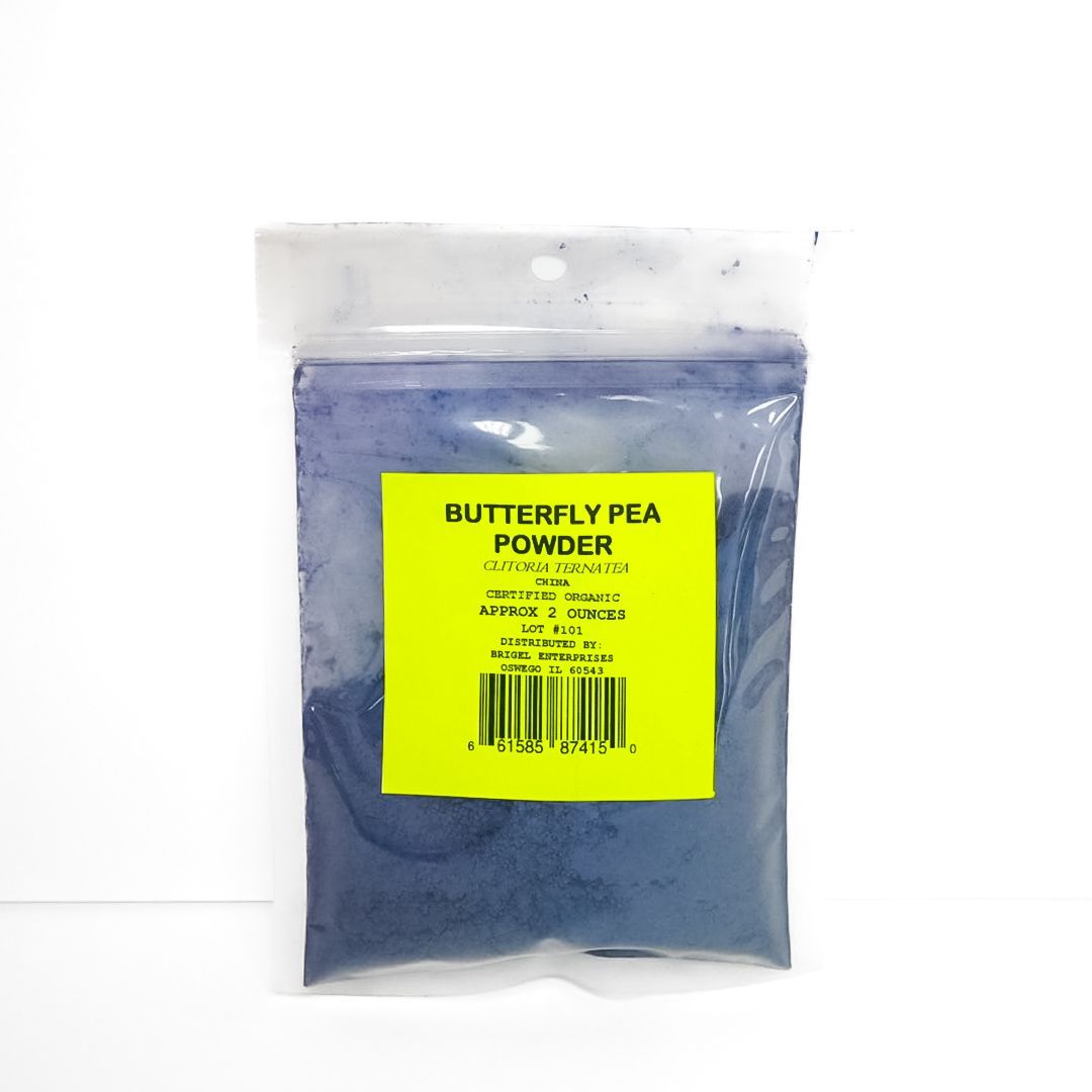 Blue butterfly pea powder in a clear plastic pouch with a yellow label and barcode