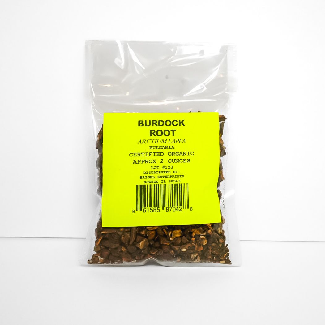 Clear plastic bag of dried roots with a bright yellow label on a white background