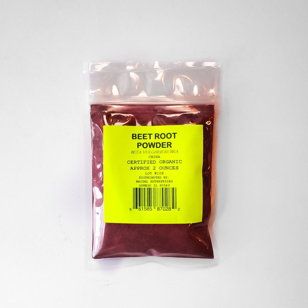 Small clear plastic packet of beet root powder with a bright yellow label on a white background