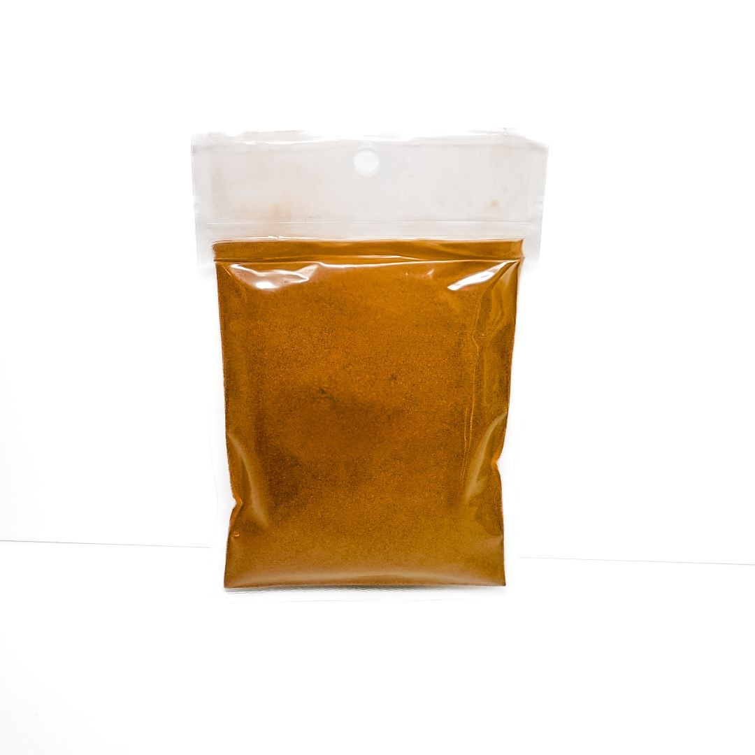 Clear plastic bag of burdock root powder with a yellow label on a white background