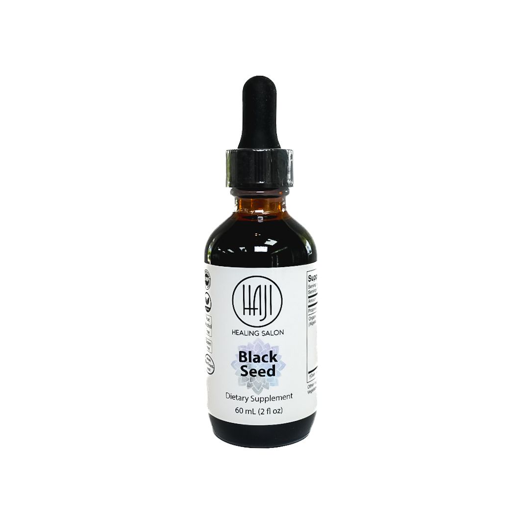 Amber dropper bottle labeled “Black Seed” on a white background