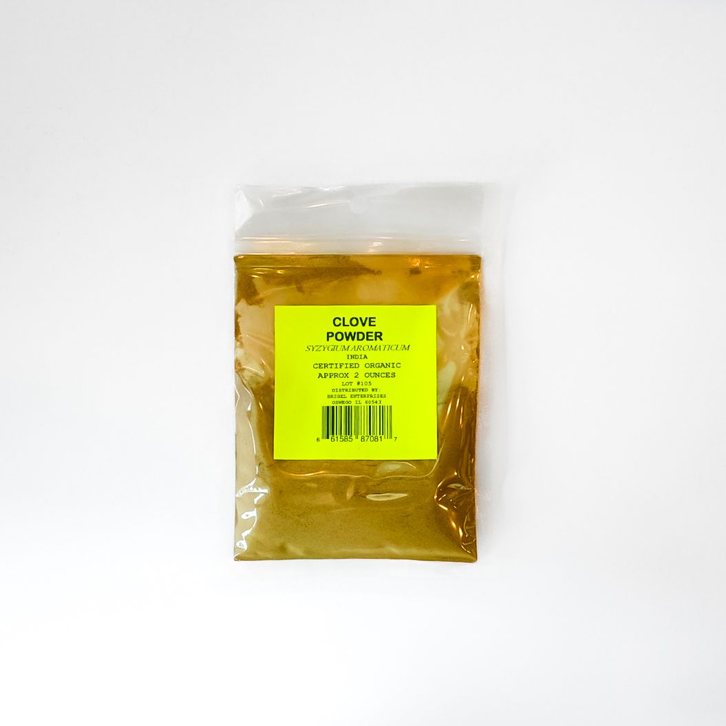 Small clear plastic bag of yellow liquid with a bright green label on a white background