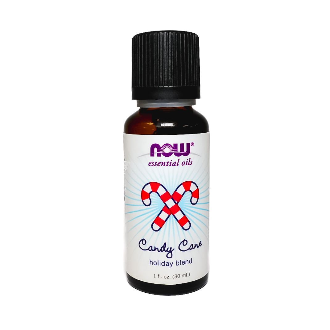 Brown essential oil bottle labeled “Candy Cane” with black cap and red-white candy cane graphic