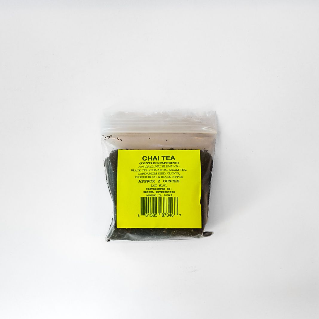 Small clear tea pouch with a bright yellow label on a white background.