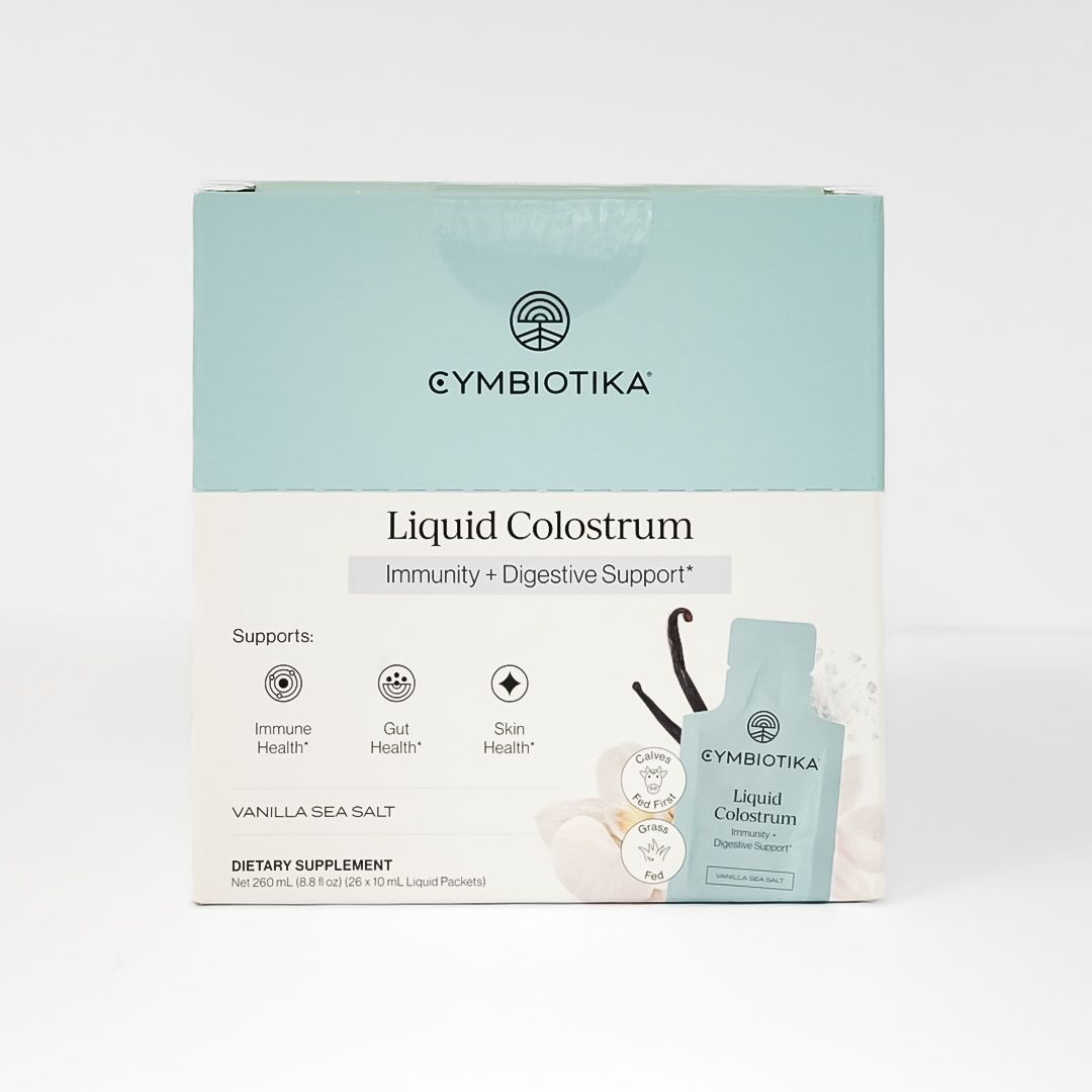 Eymbiotika Liquid Colostrum supplement box in pale blue and white packaging