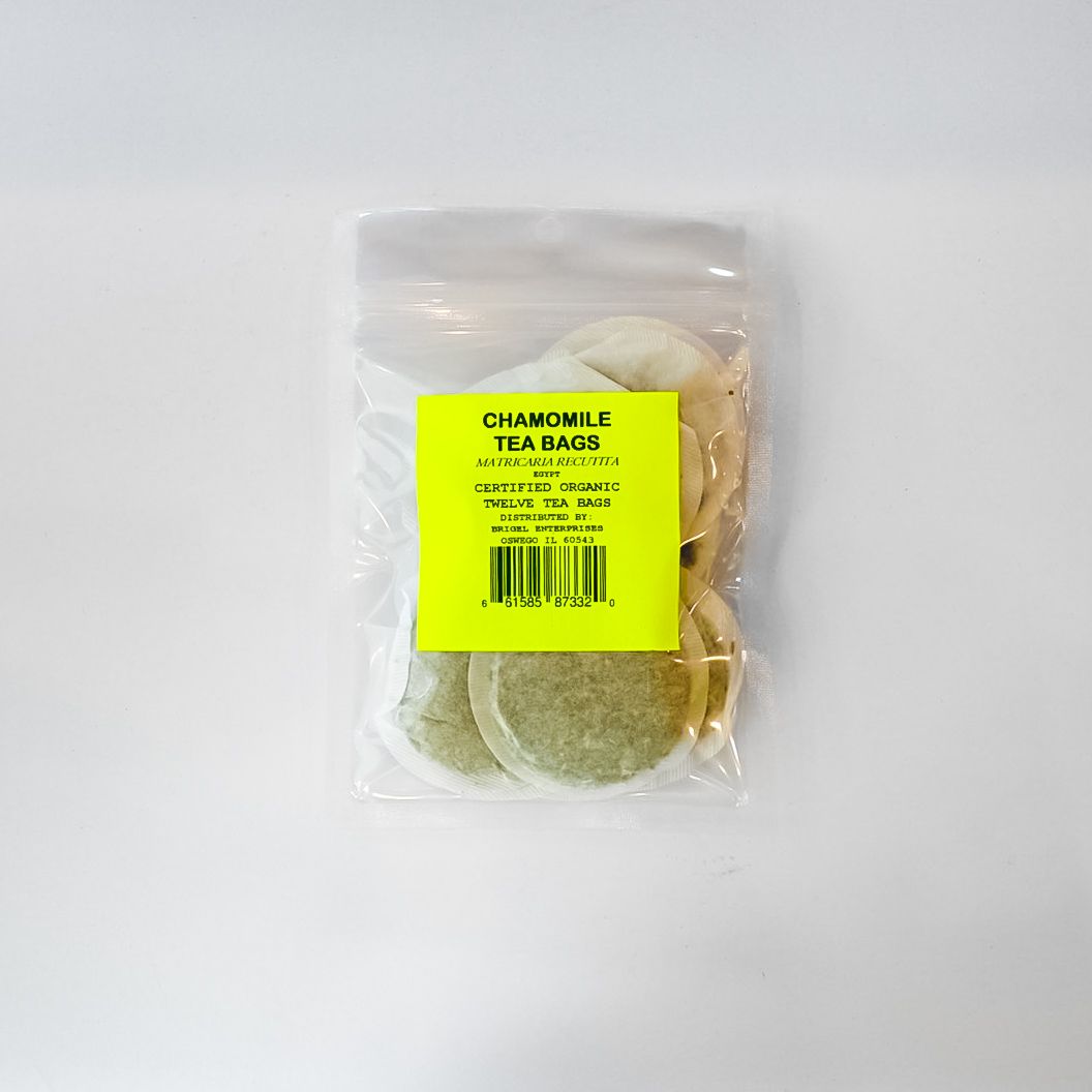Clear plastic bag of chamomile tea bags with a bright yellow label on a white background