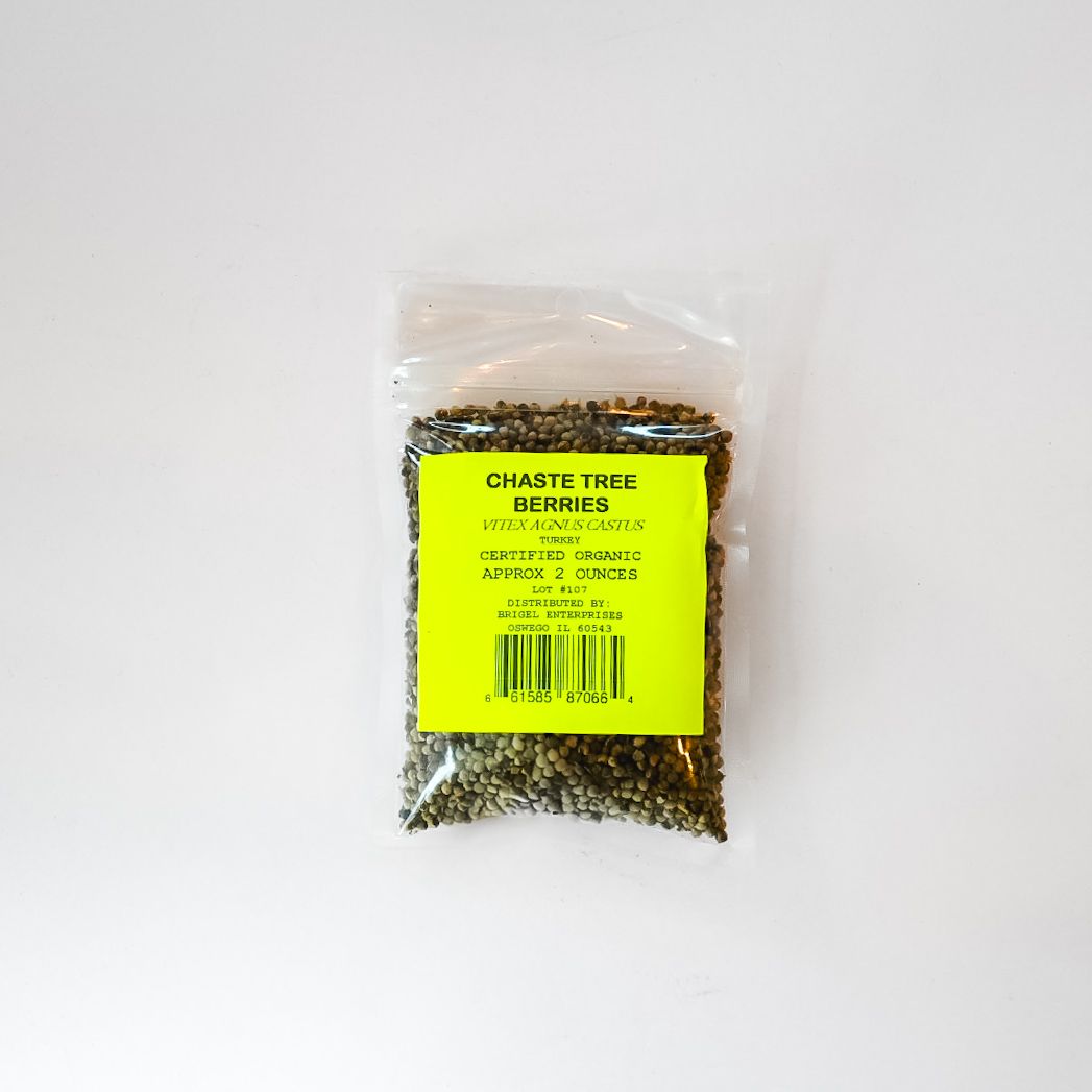 Small clear plastic bag of dried herbs with a bright yellow label on a white background