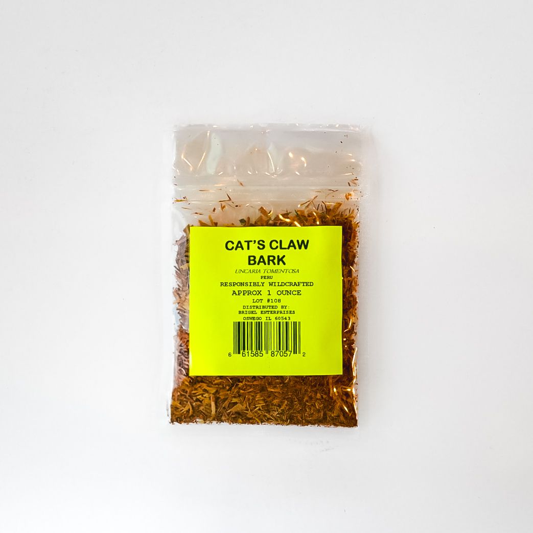 Small clear plastic pouch of cat’s claw bark with a bright yellow label on a white background