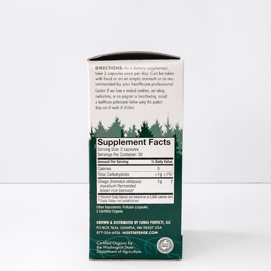 Host Defense Mushrooms Chaga supplement box with orange mushroom graphic and green forest scene
