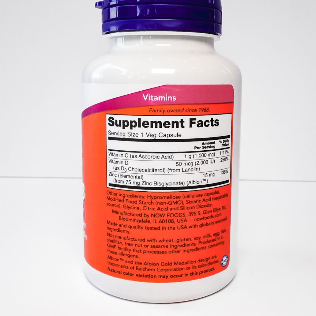 NOW C-1000 Zinc & D-3 dietary supplement bottle with purple cap on white background