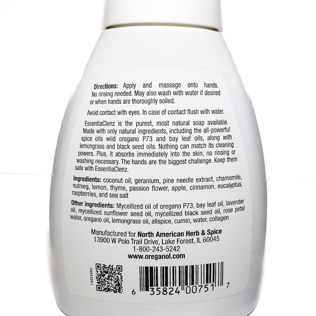 White pump bottle of Essential Clenz hand soap with green leaf graphic and purple label on a white background