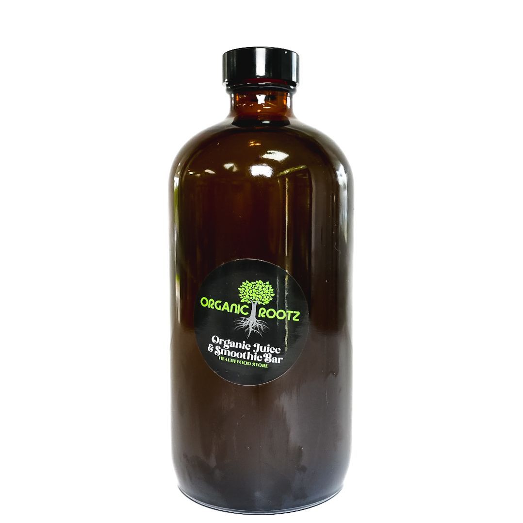 Amber glass bottle with black cap and green Organic Rootz label on a white background