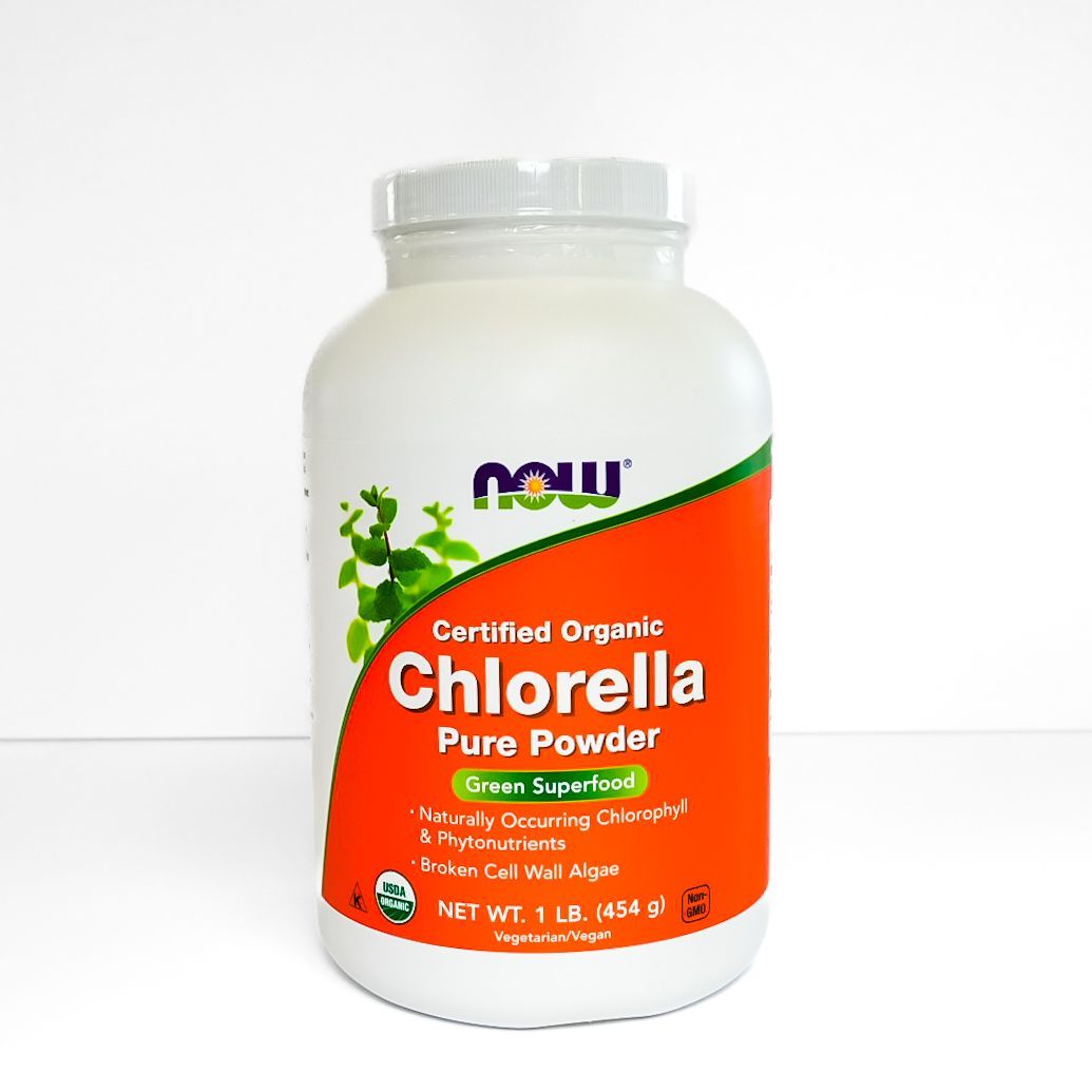 White bottle of NOW Certified Organic Chlorella pure powder with orange label and green accents
