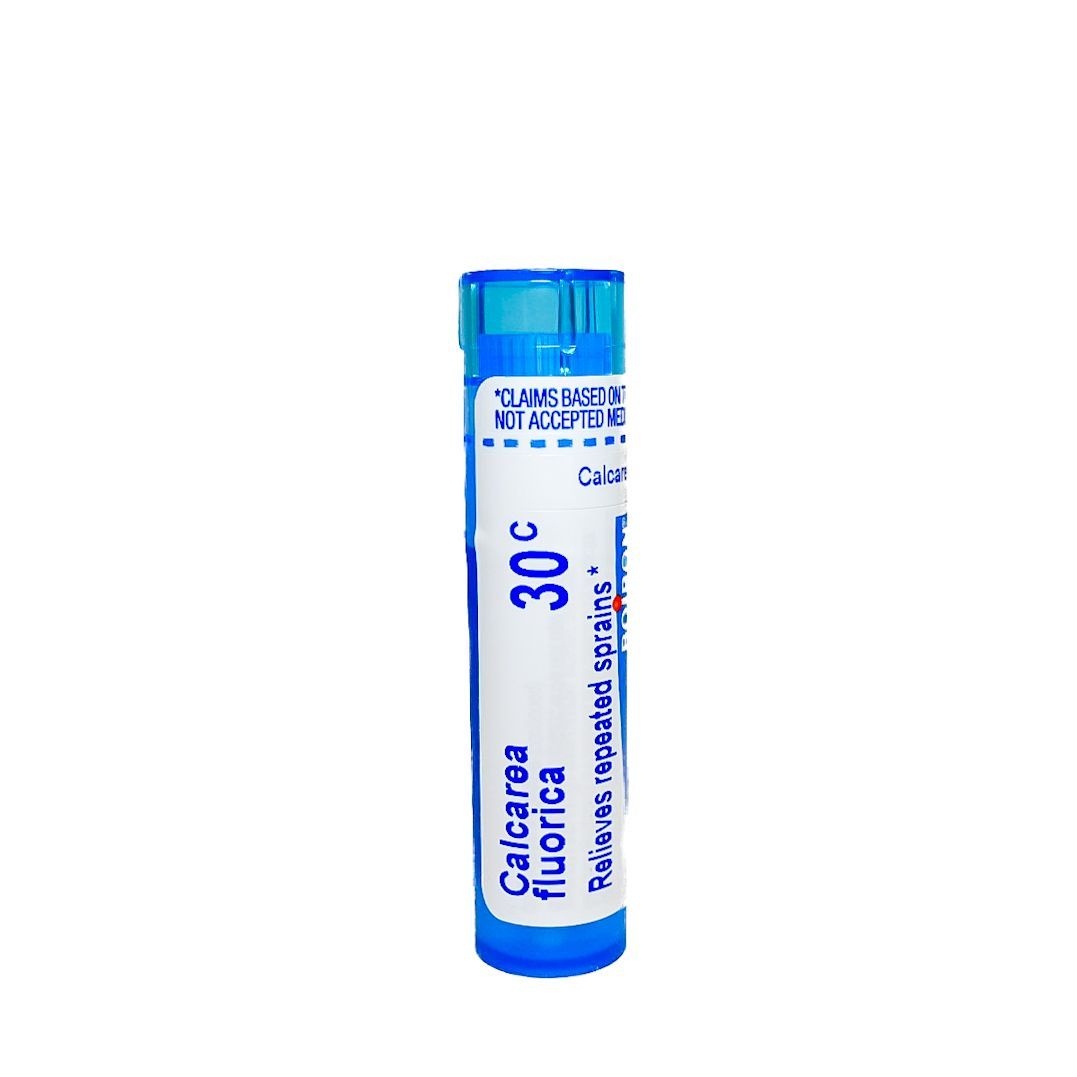 Blue fluoride toothpaste tube with 30g label on white background