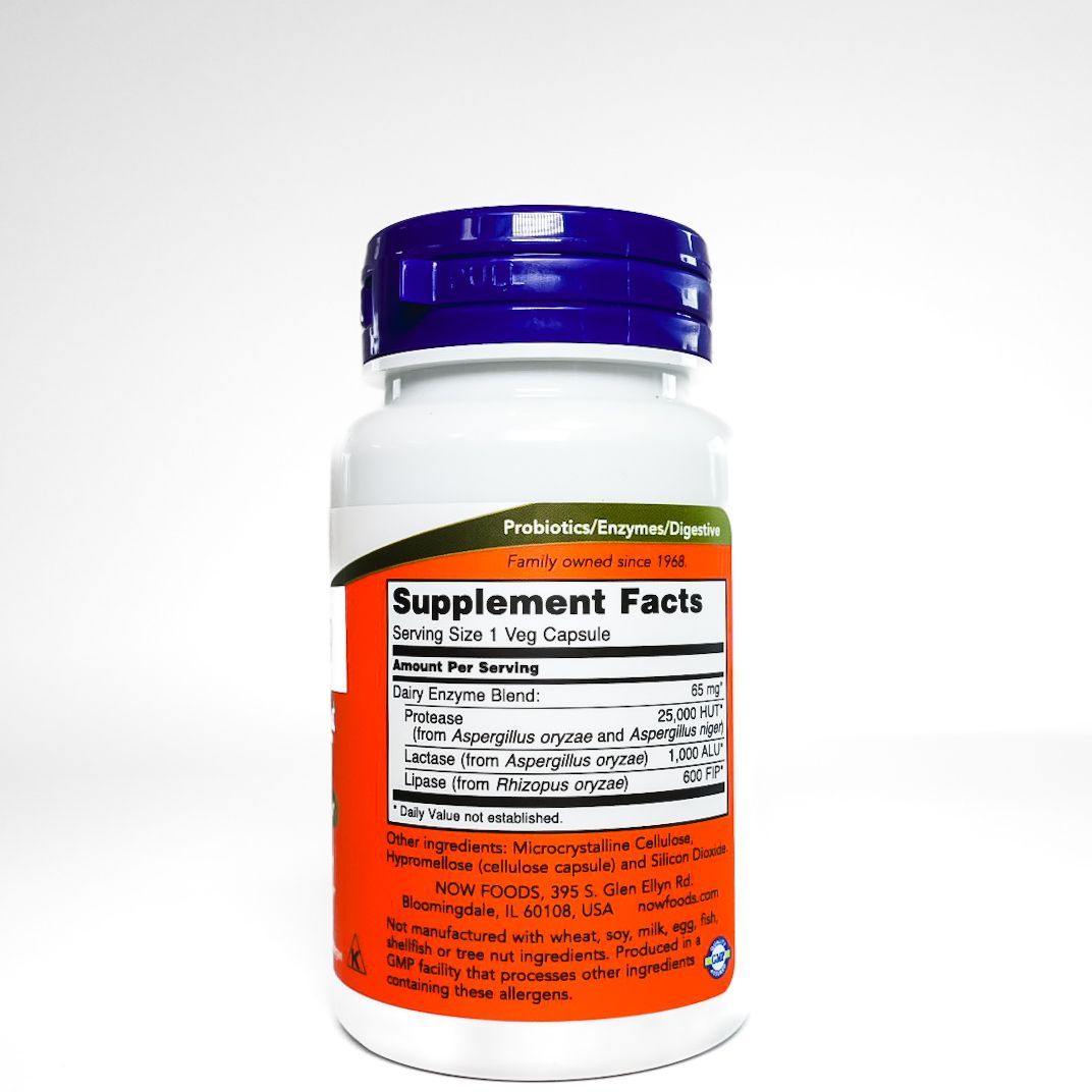 Now Dairy Digest Complete supplement bottle with blue cap and orange label on white background