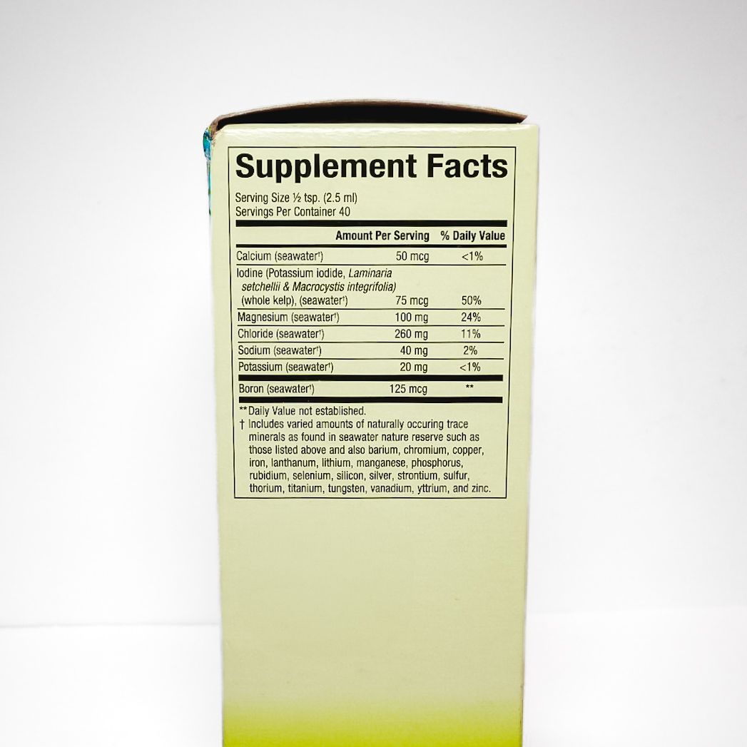 Whole Earth & Sea Pure Food Deep Ocean Minerals supplement box, white and yellow packaging with blue accents