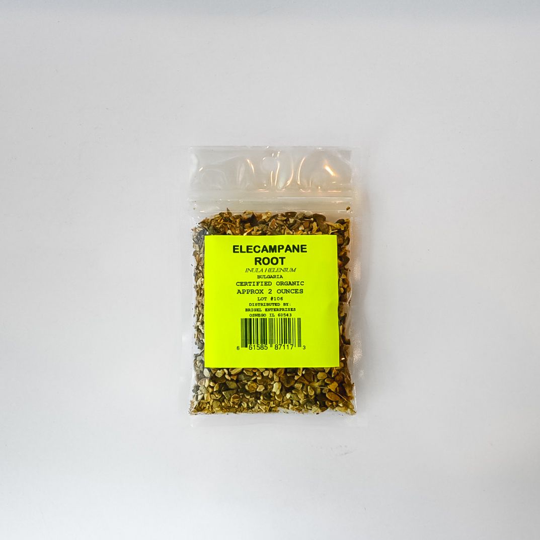 Small clear plastic bag of dried herbs with a bright yellow label on a white background