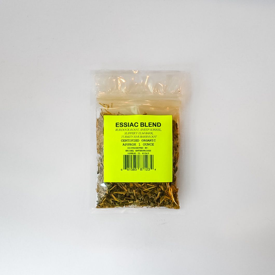 Small clear plastic bag of dried herbal blend with bright yellow label on a white background