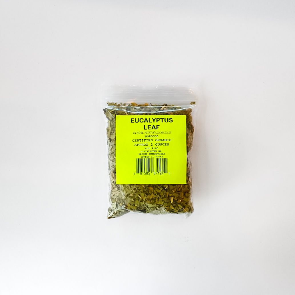 Small clear plastic bag of dried herbs with a bright yellow label on a white background